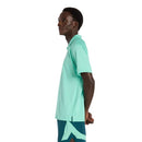 New Balance Polo Tournament Novelty Heren Groen Links